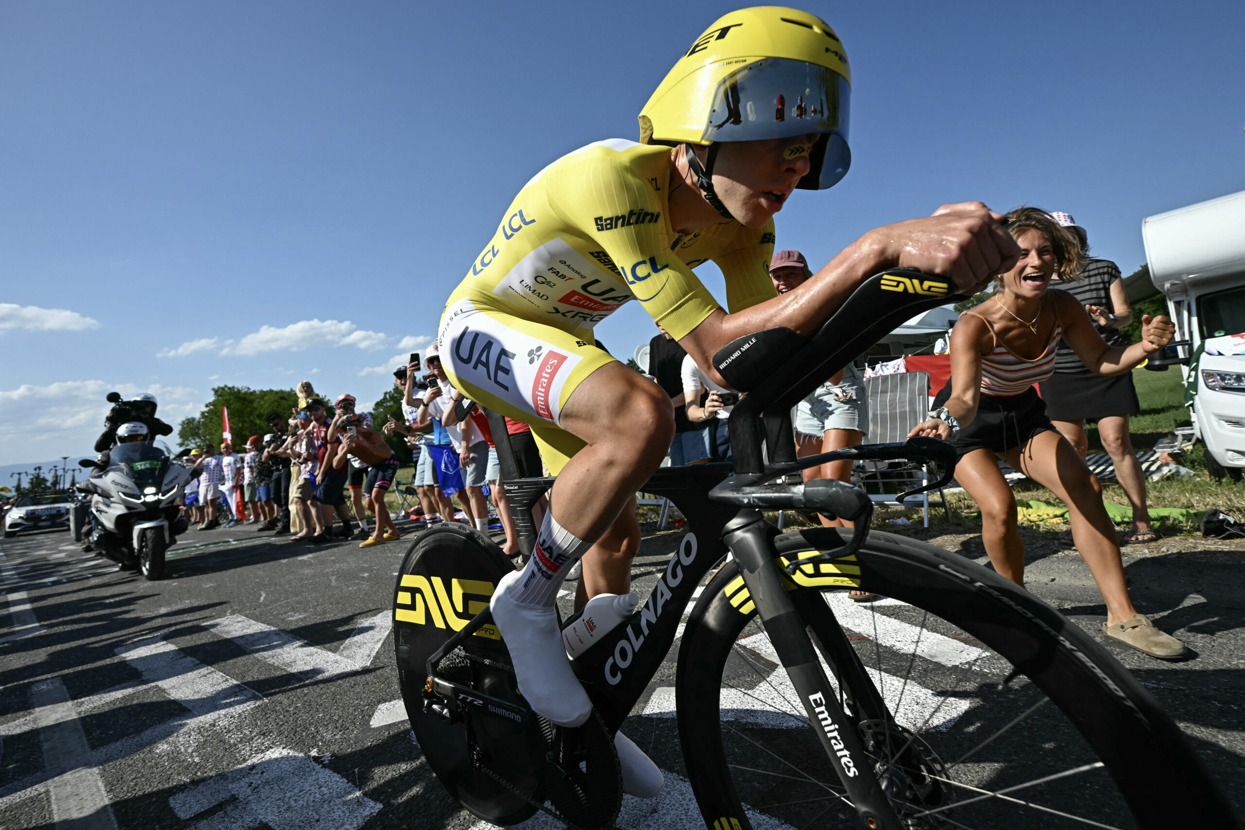 Evenepoel time trial - Tadej Pogacar wearing the overall leader's yellow jersey cycles during the 16th stage of the 113t