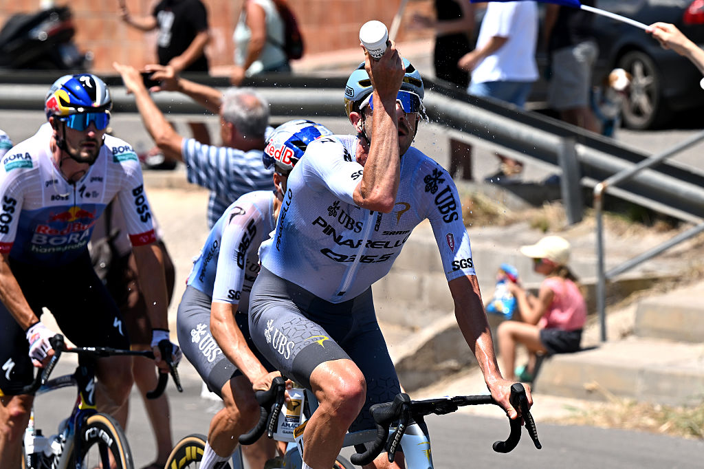 Tour de France heat - Chris Harper of Australia and Team Pinarello Q36.5 Pro Cycling refreshes during the 113th Tour de Franc